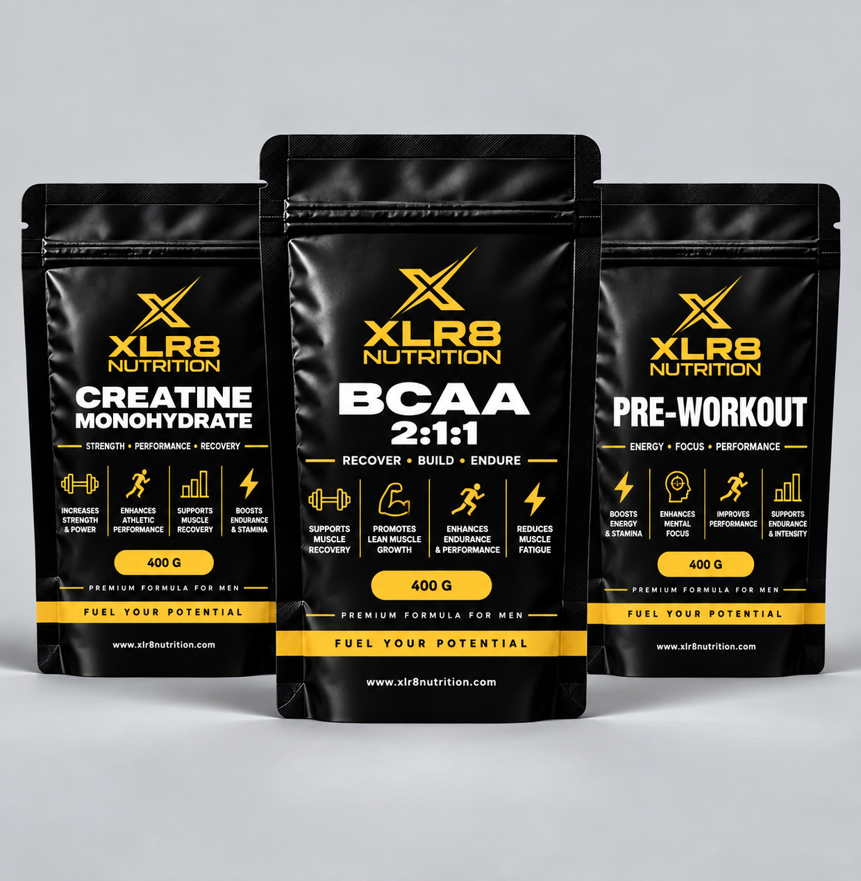 Three black stand-up pouches of XLR8 Nutrition supplements arranged in a row against a light gray background. The center pouch is labeled BCAA 2:1:1, flanked by Creatine Monohydrate on the left and Pre-Workout on the right.