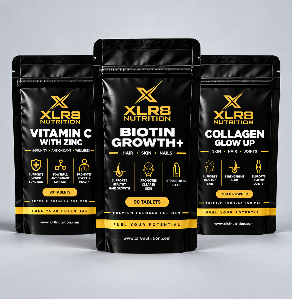 Three black supplement pouches from XLR8 Nutrition arranged in a fan shape on a light gray background. The center pouch is labeled 'Biotin Growth+' and the side pouches are labeled 'Vitamin C with Zinc' and 'Collagen Glow Up'.