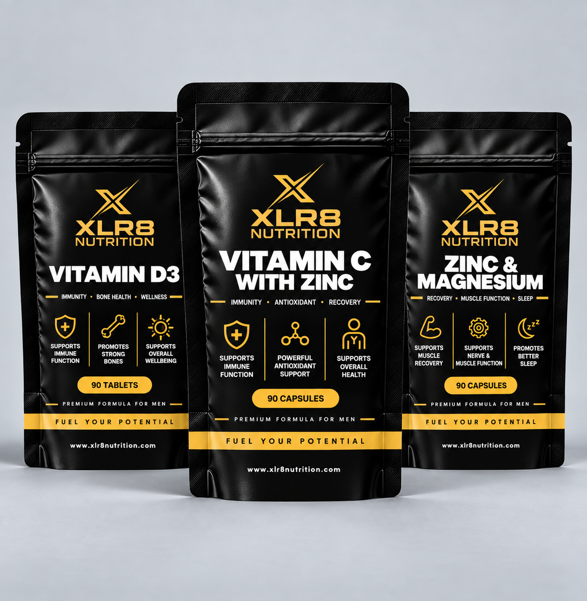 Three black stand-up supplement pouches from XLR8 Nutrition arranged together on a light gray studio background. The center pouch is larger and reads 'Vitamin C with Zinc', while the left and right pouches read 'Vitamin D3' and 'Zinc &amp; Magnesium'.
