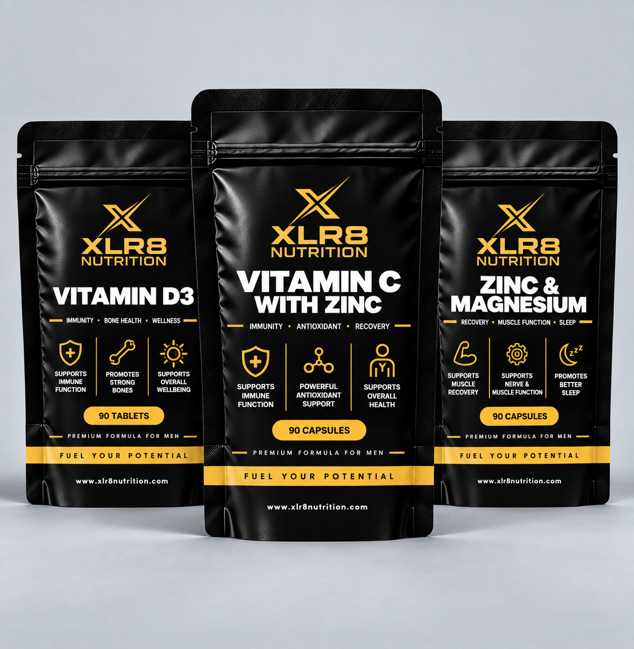Three black stand-up supplement pouches from XLR8 Nutrition arranged together on a light gray studio background. The center pouch is larger and reads 'Vitamin C with Zinc', while the left and right pouches read 'Vitamin D3' and 'Zinc & Magnesium'.