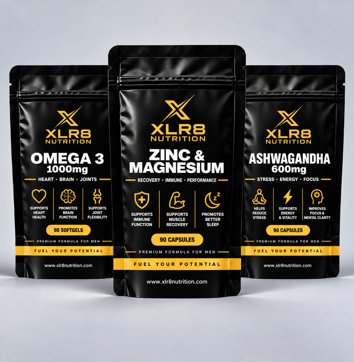 Three black supplement pouches from XLR8 Nutrition are displayed against a light gray background. The center pouch is for 'Zinc &amp; Magnesium 5000mg', flanked by 'Omega 3 1000mg' on the left and 'Ashwagandha 600mg' on the right.
