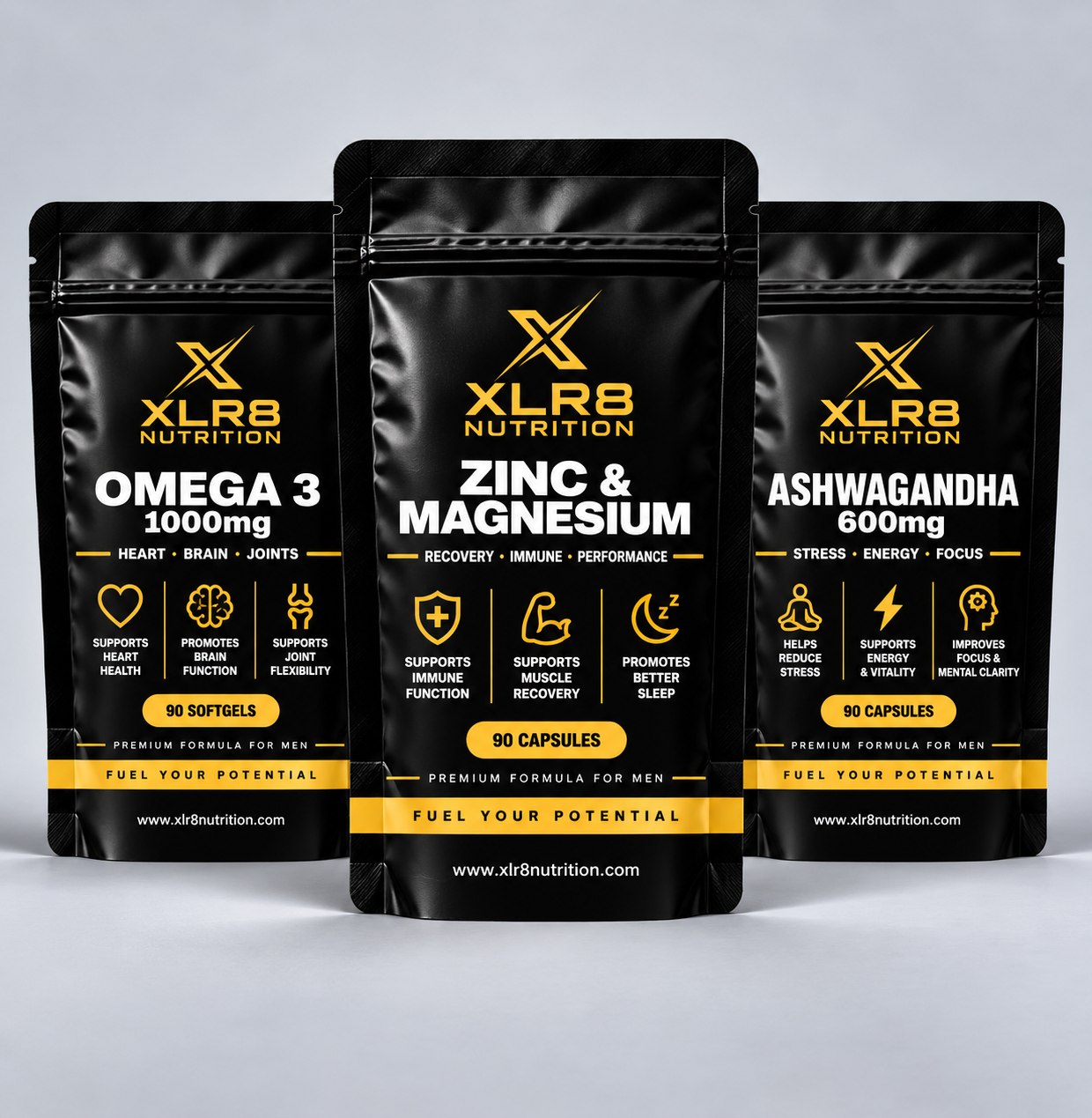 Three black supplement pouches from XLR8 Nutrition are displayed against a light gray background. The center pouch is for 'Zinc & Magnesium 5000mg', flanked by 'Omega 3 1000mg' on the left and 'Ashwagandha 600mg' on the right.